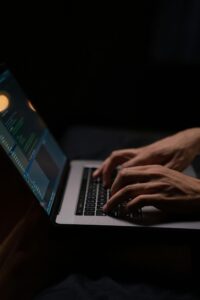 person-using-silver-and-black-laptop-computer